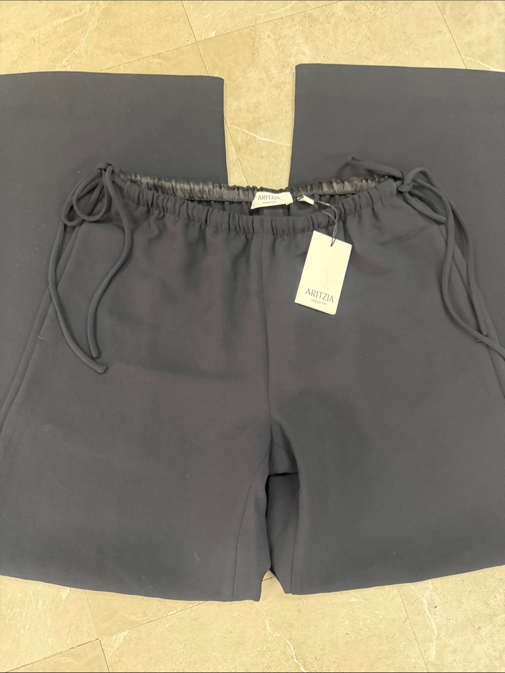 aritzia wide-leg drawstring waist pants in black color